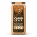 Bushcraft Coffee Cabin Fever fall seasonal blend, 12 oz kraft bag with log cabin illustration
