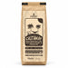 Bushcraft Coffee Castaway medium roast, 12 oz kraft bag with palm trees and hammock illustration